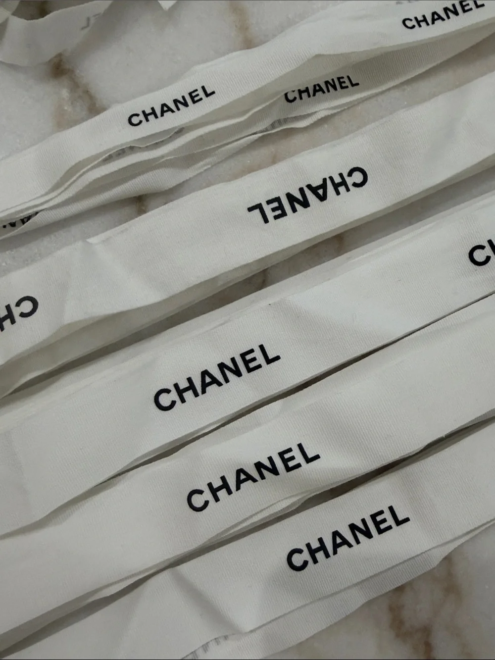 CHANEL White Ribbon Ties with White Camellia Flowers